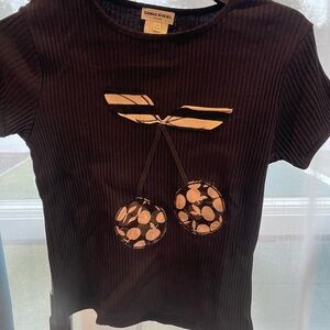 Beaut top. Like new. It will fit 10-12 year old girl better.